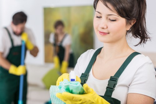 Team member checking a risk assessment before cleaning